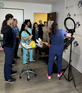 Medical professionals receiving aesthetic injector training in Toronto at CAMA